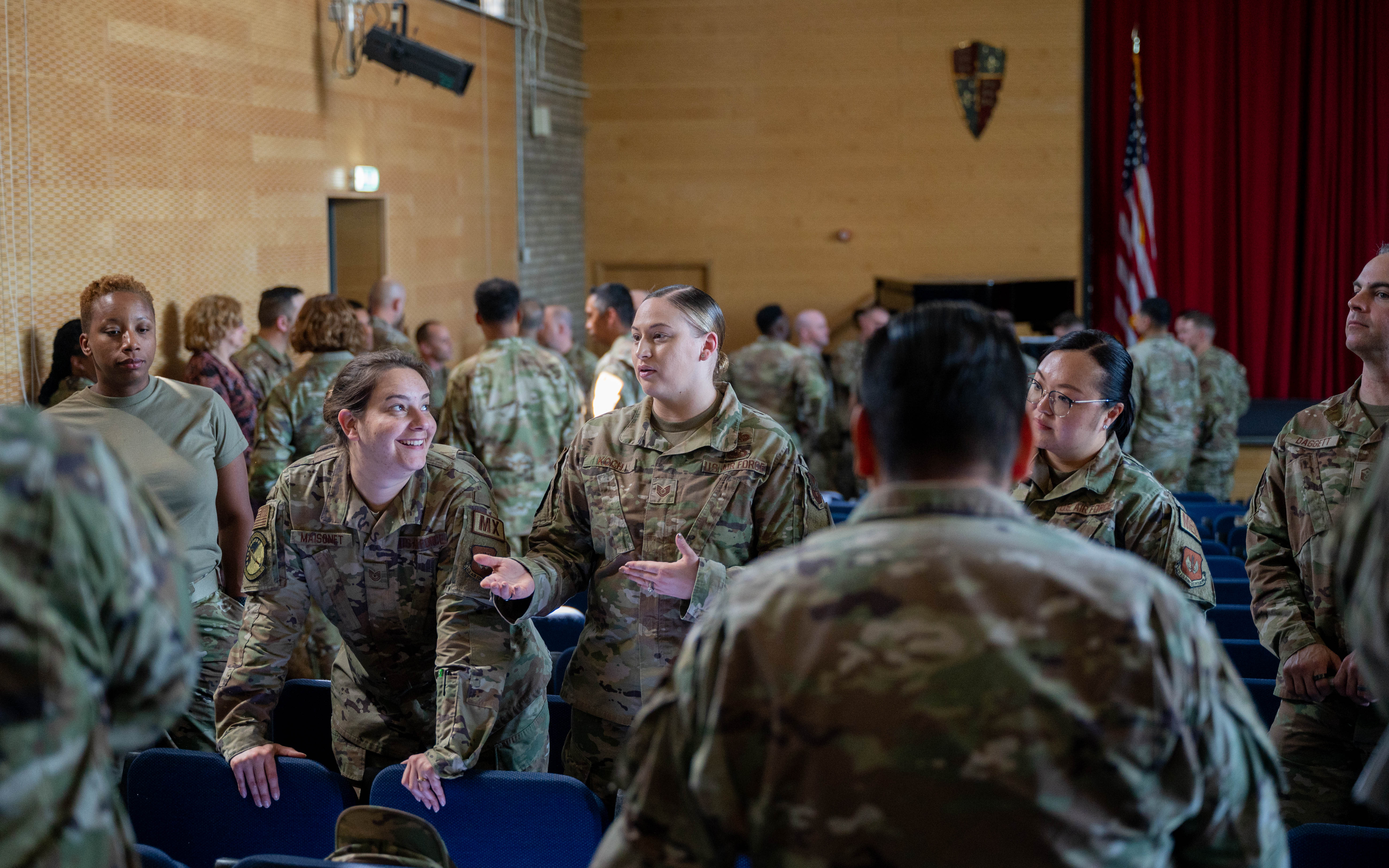 Airmen talking with each other